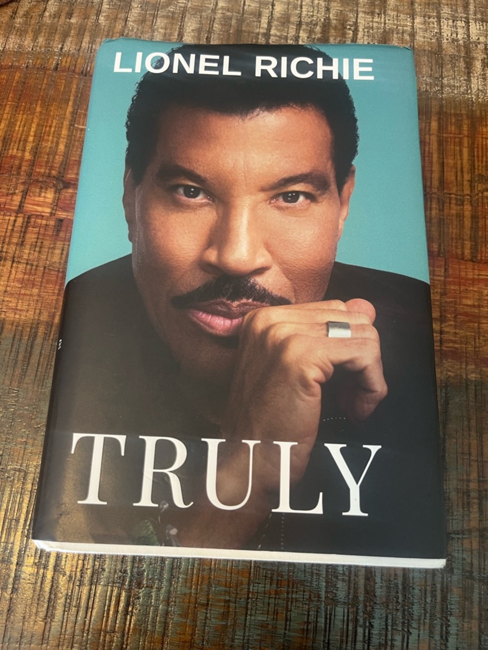 Lionel Richie "Truly" Hardcover Book - Teal & Black Cover